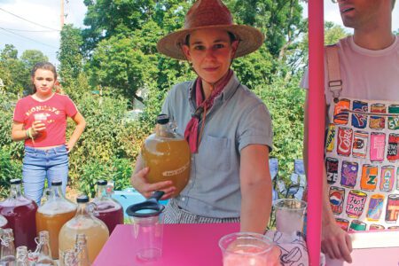 A person holding a jar